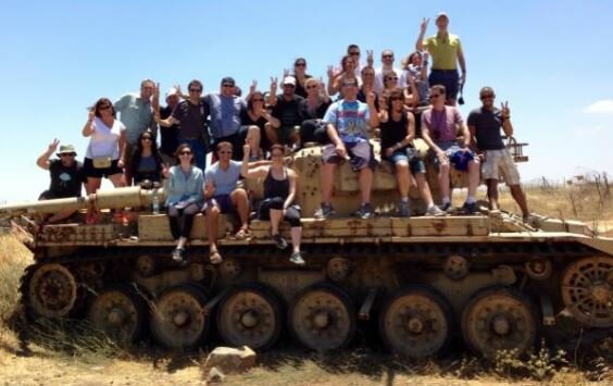 Group shot on a tank left from the 1973 Yom Kippur War